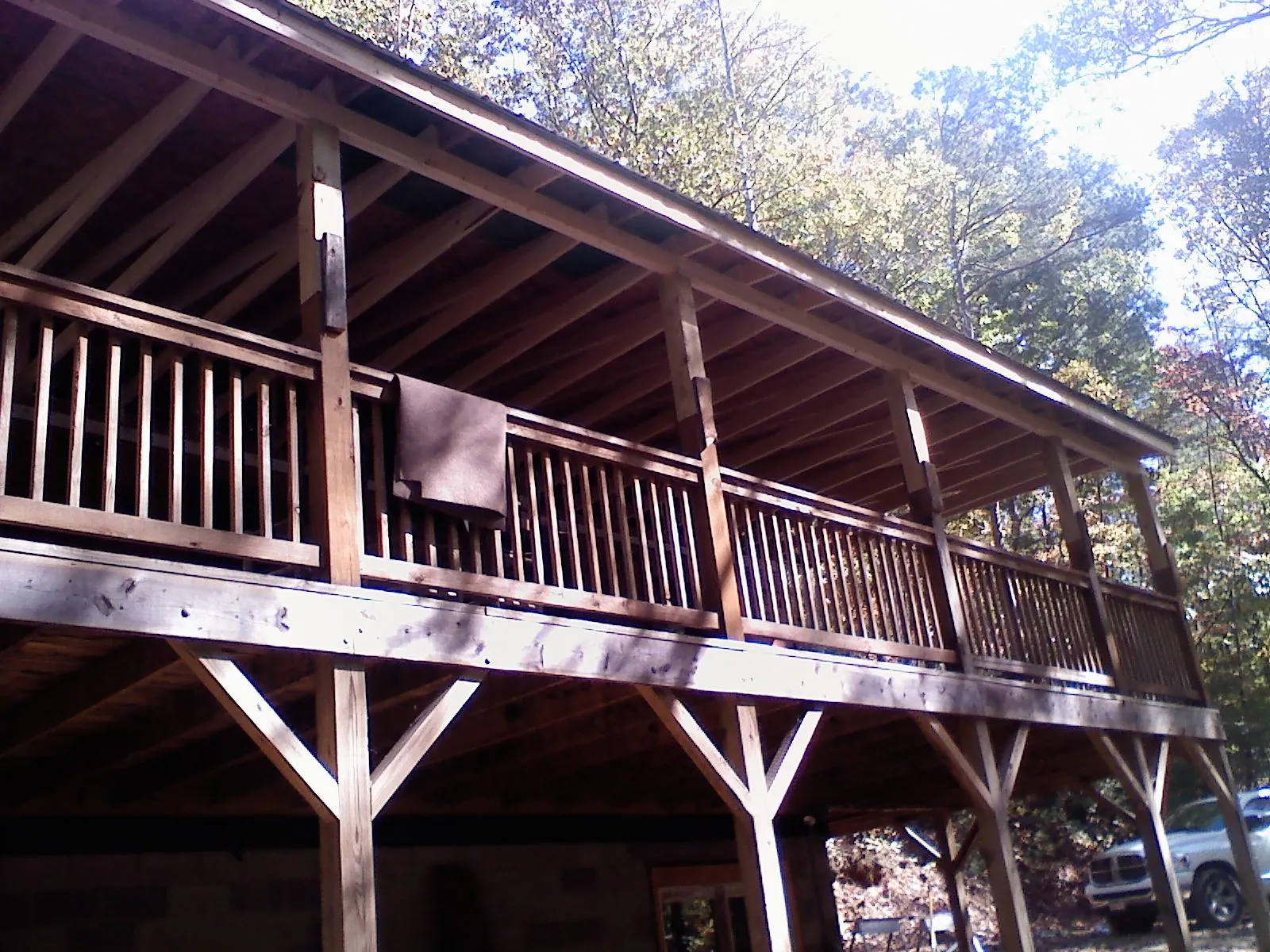 Timber framing under a new elevated porch and deck — Roof Leak Repair in Laceyville by Roofing Brothers